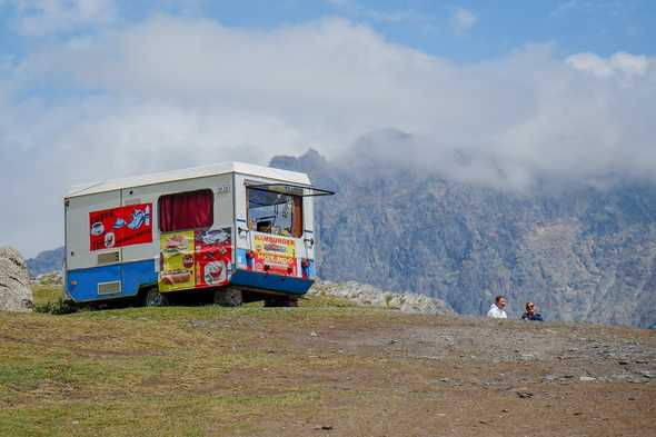 Fast food stall around Cminda Sameba. Stepantsminda, Georgia