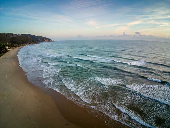 Lone out-of-the-season surfer in Sperlonga, Italy